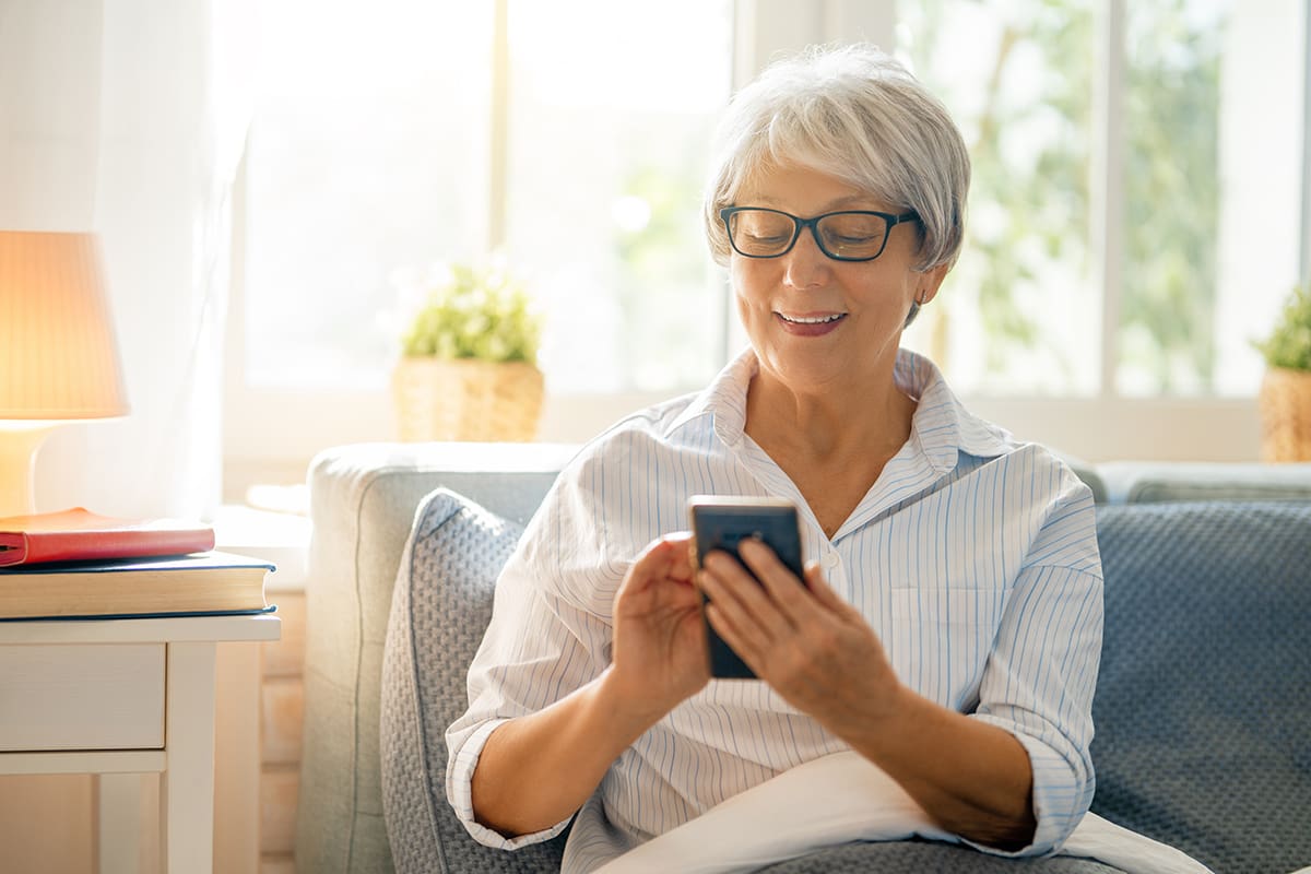 Older Adult Woman Looking at Smartphone