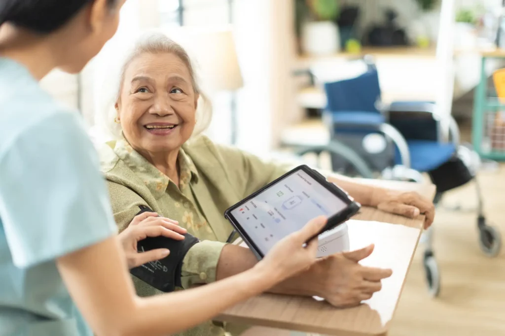 woman using ai to help senior resident